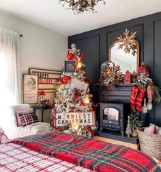 a bedroom decorated for christmas with red and green decorations