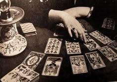 a table topped with lots of playing cards