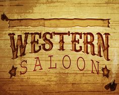 the western saloon sign is painted on a wooden wall