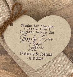 a wooden heart with the words, thanks for sharing a little love and laughter before the happy ever after