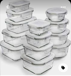 a stack of glass casserole dishes with lids