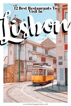 a yellow trolley is on the tracks in front of an old building and cobblestone street