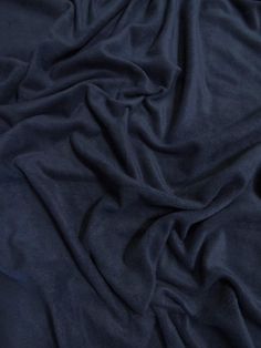 the fabric is very dark blue in color