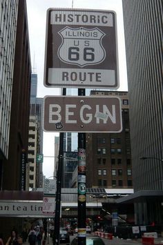 an old route 66 sign in the city