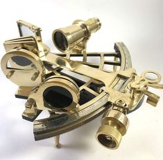 "Sextant | Brass Hand-Made 9\" Sextant | Nautical Working Sextant | Marine NAVIGATIONAL Ship Instrument | Working Brass Sextant Handmade- Material - Brass Sextant Size : 9 x 9 x 4.33 Inch (L x B x H) Finish - Shinny Polished Brass Weight - 2 kg (approx) LOOK PICTURES FOR ACTUAL LOOK OF THE ITEM These Sextants are not an antique but we can replicated as same as originals. A great work by Indian artisans. These Sextants are fully functional and made out of brass & polished finish. These Sextants a Bronze Gifts, Ship Decor, Wooden Mirror, Vintage Nautical, Antique Collection, Polished Brass, Brass Finish, Decorative Objects, Vintage Brass