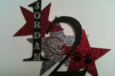 a red and black glittered sign that reads born to bear