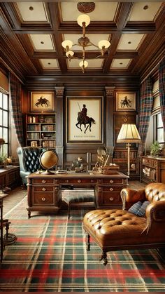 a room with a couch, chair, desk and bookcases in the center