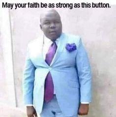 a man in a blue suit and purple tie standing next to a wall with the caption, may our friend be a strong as that button