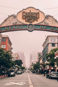 an arch over the road that says heart of san francisco