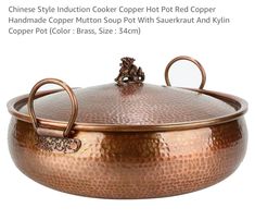 a large copper pot with handles and handle is shown in this advertisement for the chinese style induction cooker hot pot red copper