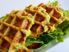 some waffles that are sitting on top of lettuce