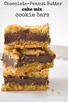 three pieces of chocolate and peanut butter bars stacked on top of each other