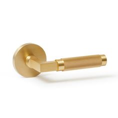 an image of a brass door handle on a white background