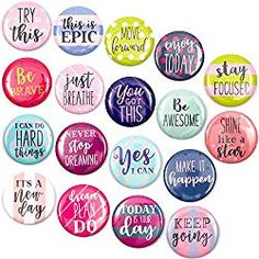 a bunch of buttons with different sayings on them