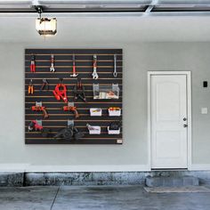 there is a garage with tools hanging on the wall