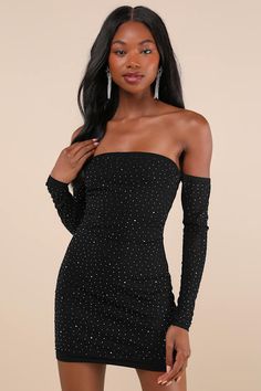 In order to turn heads all night long, simply slip on the Lulus Magnetic Glam Black Mesh Rhinestone Off-the-Shoulder Mini Dress! Glittering, gunmetal-colored rhinestone studs adorn stretchy mesh knit as it shapes an elasticized, off-the-shoulder neckline (with hidden no-slip strips) framed by long, sheer sleeves (with elastic at the shoulders). Fitted bodice flows into a figure-flaunting bodycon skirt with a sexy mini hem. Hidden back zipper/clasp. Fit: This garment fits true to size. Length: Mi Adhesive Bra, Bodycon Skirt, Rhinestone Studs, Night Out Dress, Goth Outfits, Body Con Skirt, Strapless Bra, Sheer Sleeves, Black Mesh