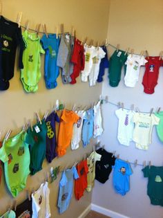 there are many baby ones hanging on the clothesline and in front of the wall