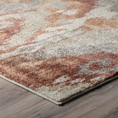 an area rug with various colors and patterns