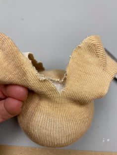 someone is peeling off the bottom of a sock