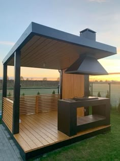 a hot tub sitting on top of a wooden deck