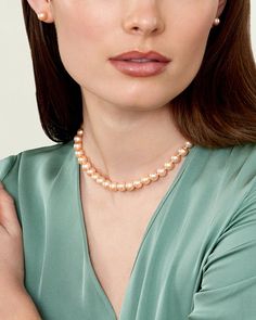 This 8.0-8.5mm peach freshwater pearl necklace is certain to be a favorite for any occasion. This pearl necklace is compiled of beautiful hand picked pearls with an 'high' grade luster. The pearl necklace is brilliant peach color and comes affixed with a beautiful 14K white gold ball clasp.. Elegant Apricot Jewelry For Wedding, Elegant Peach Round Beads Necklaces, Elegant Peach Necklaces With Round Beads, Elegant Peach Round Beads Jewelry, Elegant Peach Round Bead Jewelry, Elegant Peach Pearl Jewelry, Elegant Peach Round Beaded Jewelry, Elegant Peach Jewelry For Formal Occasions, Elegant Round Peach Jewelry