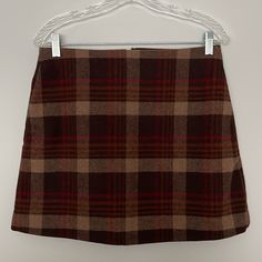 Uniqlo Women’s Wool Blend Skirt Plaid Dark Brown With Side Pockets Zipper Back Closure With Clasp Fully Line Inner Materials; 67% Polyester, 33% Wool, Polyester Lining Size 8 Made In China New With Tag Heck Pictures For Additional Measurements Fitted Uniqlo Bottoms For Fall, Winter Brown Lined Mini Skirt, Classic Brown Wool Skirt, Brown Cotton Mini Skirt, Vintage Brown Lined Mini Skirt, Brown Plaid Mini Skirt, Uniqlo Women, Plaid Mini Skirt, Plaid Skirt