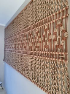 a wall hanging made out of woven material