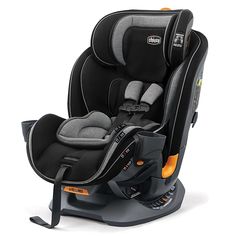 the child's car seat is black and grey with orange trims on it