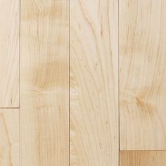 closeup of the wood grains on a wooden floor that is made from natural white oak