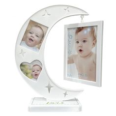 a baby's photo is hanging on the crescent shaped frame with stars around it