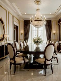 an elegant dining room with chandelier and marble flooring