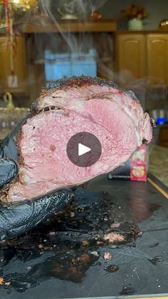 a large piece of meat sitting on top of a counter