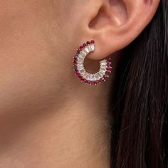 Elevate Your Attire With These Dazzling Hoop Earrings. Crafted In Fine 14k Yellow Gold. These Earrings Feature Prong Set Baguette Cut Diamonds Weighing 2.06 Carats With Round Cut Rubies Weighing 1.89 Carats. Diamond Quality: Color G-H And Clarity Si. Secured With Pushback Closure. Earring Length: 1 Inch. Width: 6.4 Mm. Total Weight: 6.08 Grams. The Earrings Come With A Presentable Gift Box. Id: 02093 Fine Jewelry Red Hoop Earrings, Red Round Hoop Earrings Fine Jewelry, Red Hoop Fine Jewelry, Elegant Red Hoop Jewelry, Elegant Red Hoop Earrings For Formal Occasions, Ruby Earrings With Prong Setting, Halo Ruby Jewelry, Red Hoop Jewelry For Wedding, Red Hoop Jewelry For Formal Occasions