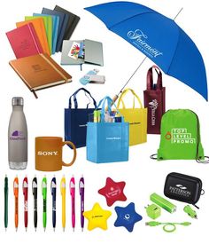 an assortment of promotional items including umbrella, notebooks and pens