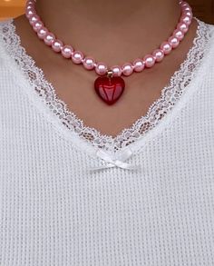 Super Glazed and Super glossy! The BONBONWHIMS' take on a classic pearl necklace -- choose between Barbie pink or elegant white glass pearls, and a cherry red heart or milky white heart charm! Both equally juicy, of course.  Pink pearl option measures at around 15" long with extender, and white pearl option measures at Charm Necklace Diy, Diy Choker, Classic Pearl Necklace, Pink Choker, Lucky Charm Necklace, Bling Earrings, Baby Pearls, Initial Earrings, Girly Gifts