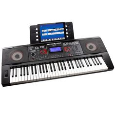 an electronic keyboard with a tablet on it's back and sound board attached to the keyboard