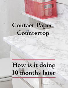 a white counter top with text overlay that reads contact paper countertop how is it doing 10 months later?