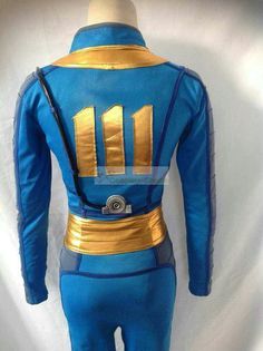 a blue and gold costume with the number 11 on it's chest, standing in front of a white background