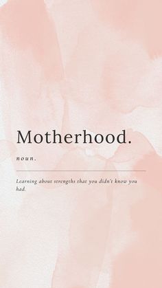 a pink watercolor background with the words motherhood written in black and white on it