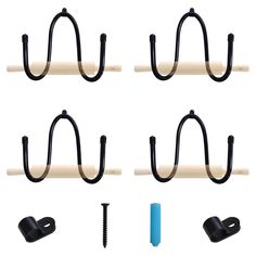 four black hooks hang on the wall next to a blue plastic tube and screws