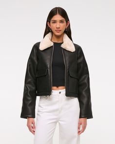 Our new trucker jacket in a soft vegan leather fabric, featuring a cozy sherpa-lined interior, sherpa-lined collar detail, front utility pockets and a zip-up front. Trendy Winter Outerwear With Contrast Collar, Fall Leather Jacket With Contrast Collar, Fall Collared Outerwear With Faux Fur Lining, Winter Collared Biker Jacket With Zipper Closure, Winter Biker Jacket With Zipper And Collar, Collared Biker Jacket With Zipper For Winter, Fitted Fall Outerwear With Contrast Collar, Winter Leather Jacket With Contrast Collar And Long Sleeves, Winter Biker Jacket With Flap Pockets