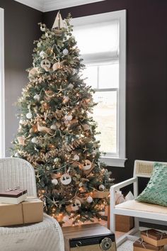 a decorated christmas tree in a living room