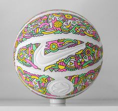 a white ball with colorful designs on it