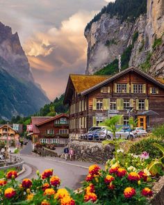 the village is surrounded by mountains and flowers