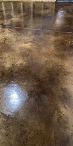 the floor is dirty and needs to be polished or waxed with some paint on it