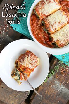 spinach lasagna rolls in a white bowl on a wooden table