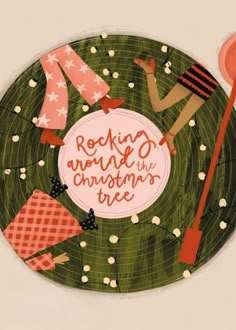 there is a green plate with an image of people in the background and words reading rocking around the christmas tree