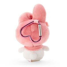 a pink stuffed animal with a clip on it's head and earphones attached to its ears