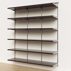 an empty shelving unit in a white room