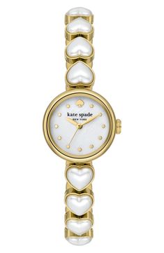 Add an elegant touch to any outfit with this chic round watch featuring a mother-of-pearl dial and a slim bracelet adorned with heart-shaped imitation pearls. 24mm case; 10mm band width Deployant clasp closure Three-hand quartz movement Mother-of-pearl dial Mineral crystal face Stainless steel with goldtone plate/imitation pearl Imported Kate Spade Watch, The Bling Ring, Preppy Jewelry, Jewelry Accessories Ideas, Dope Jewelry, Jewelry Lookbook, Girly Jewelry, Jewelry Inspo, Dream Jewelry